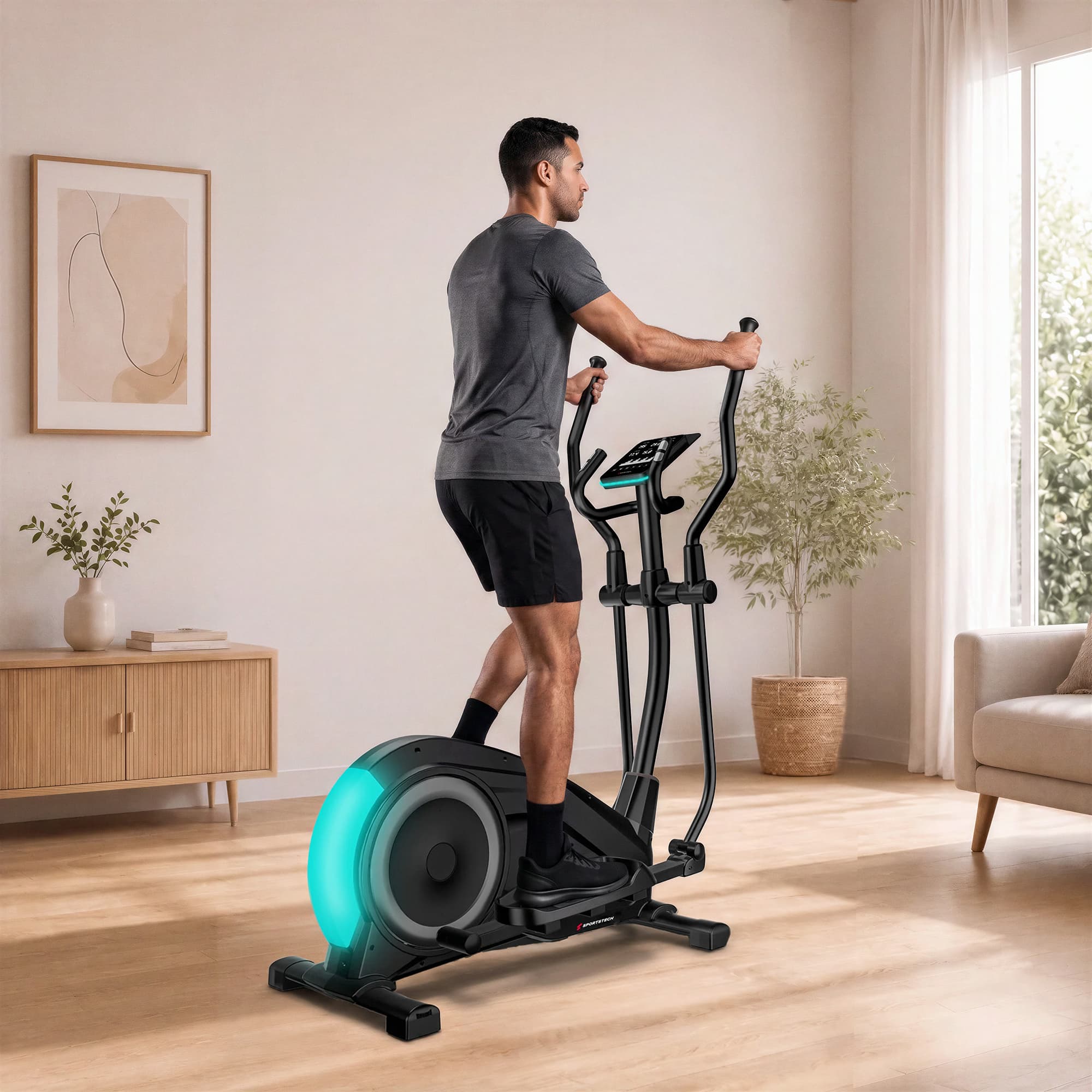 Mann trainiert im Wohnzimmer auf dem CX700 Crosstrainer mit türkis beleuchtetem Schwungrad