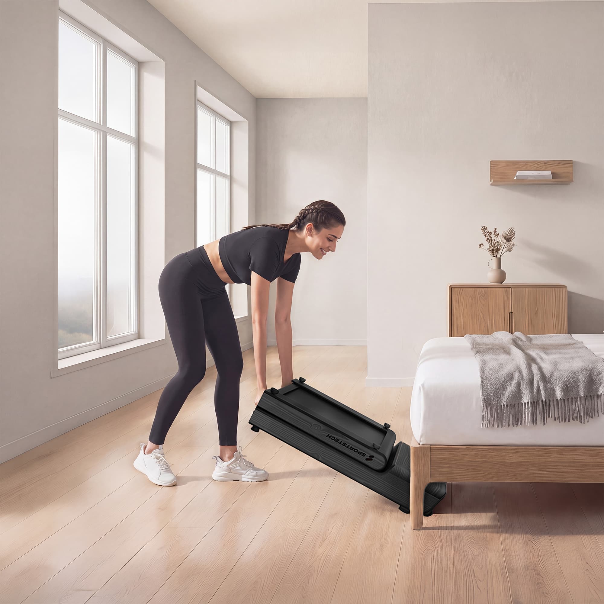 Frau stellt zusammengeklapptes graues WoodPad Pro hochkant im Schlafzimmer ab
