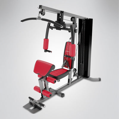 HGX100 Kraftstation seitlich von hinten mit Sitz, roten Polstern, Beinhebel und schwarzem Gewichtsblock, Freisteller