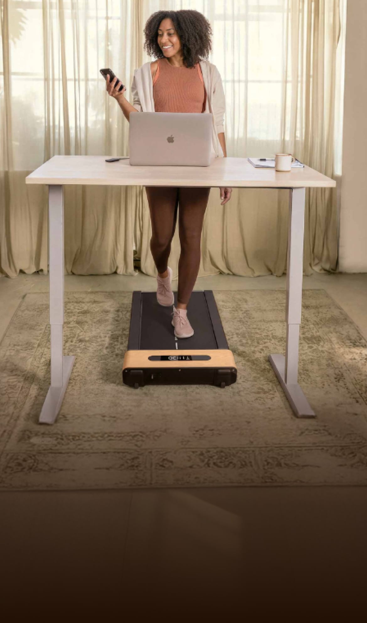 Home office with standing desk and treadmil